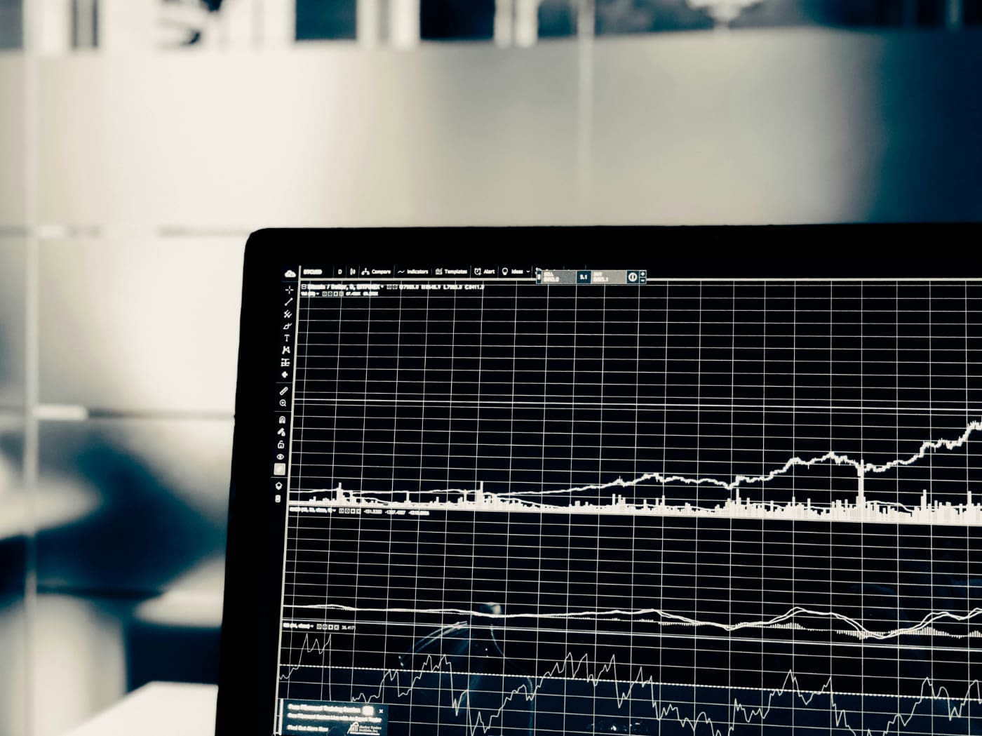 Black and white data displayed on a laptop screen.